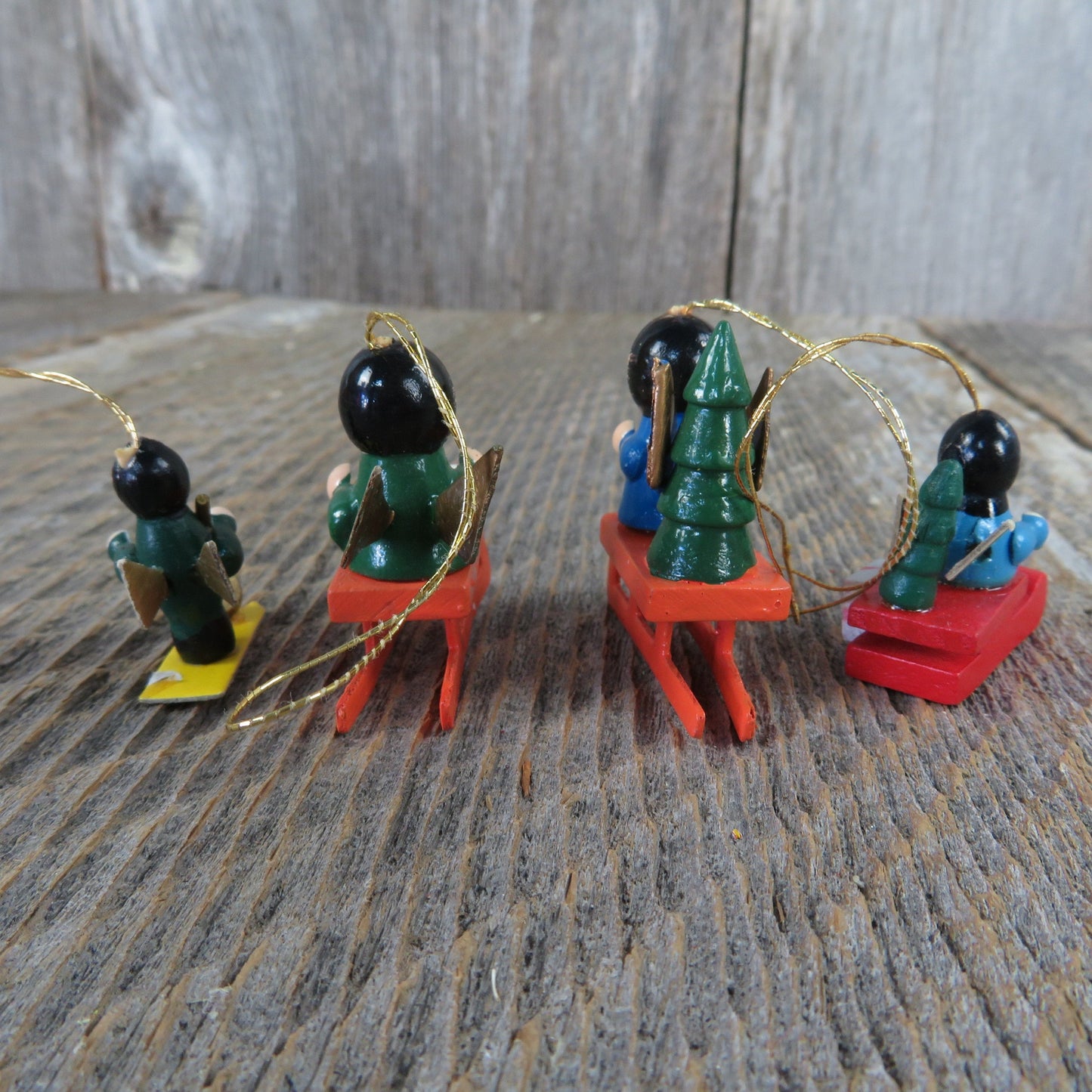 Vintage Wood Angel On Sleds and Skis Ornament Set Lot Christmas Wooden Miniature Green Red Blue
