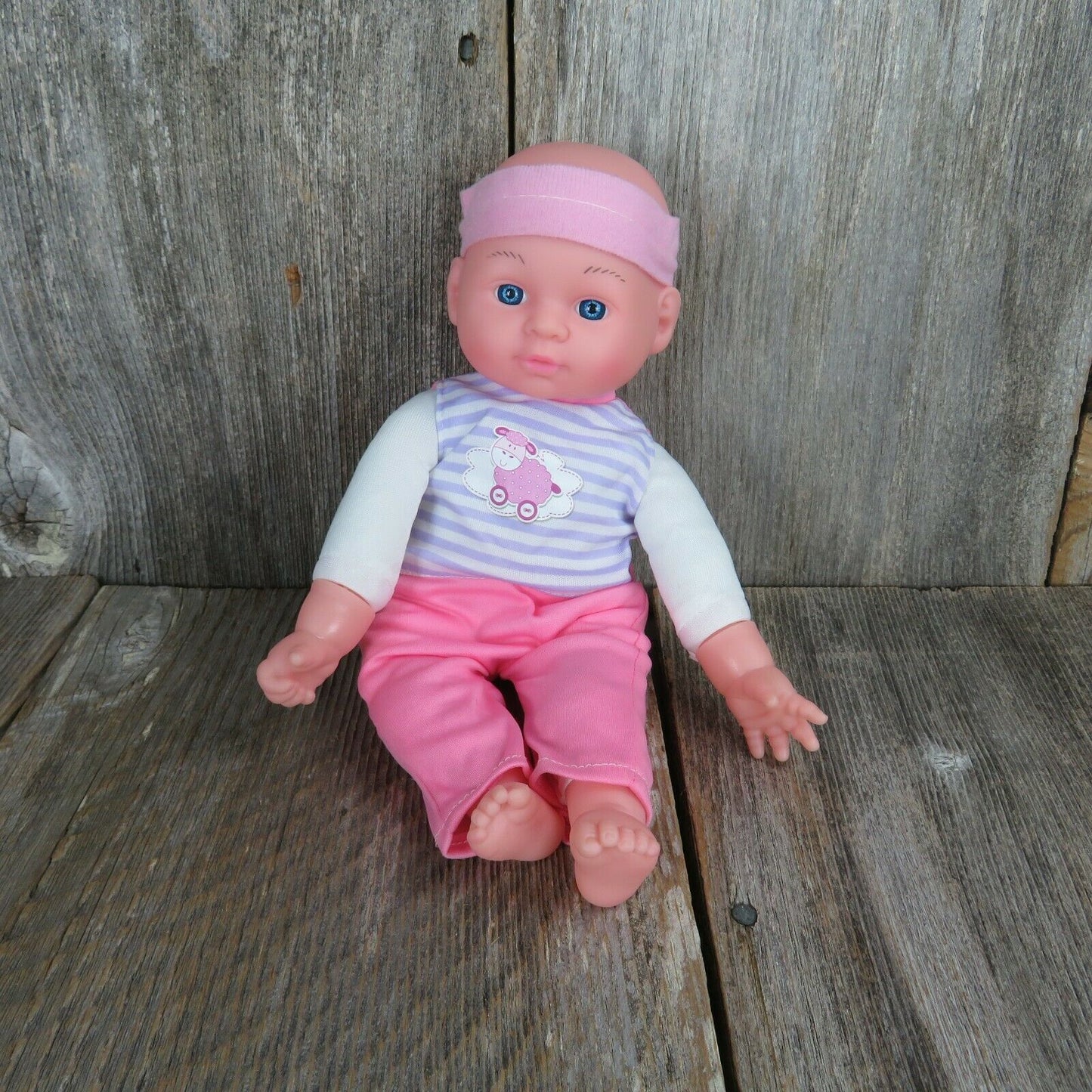 Pink Doll Soft Body Kid Concepts Bald Purple Stripe Pajamas Blue Eyes