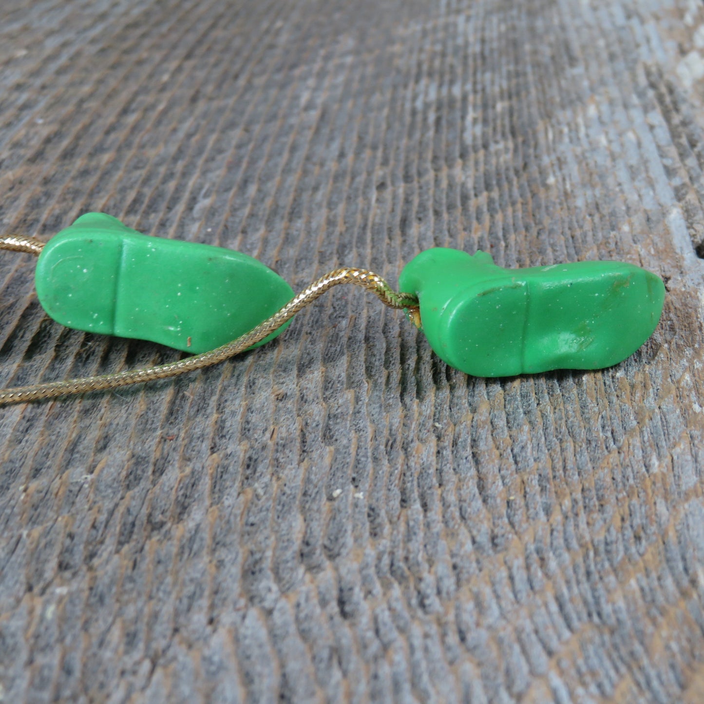 Vintage Elf Shoes with Bells Ornament Drape Over Green Plastic Christmas Green Fairy Gold Cord