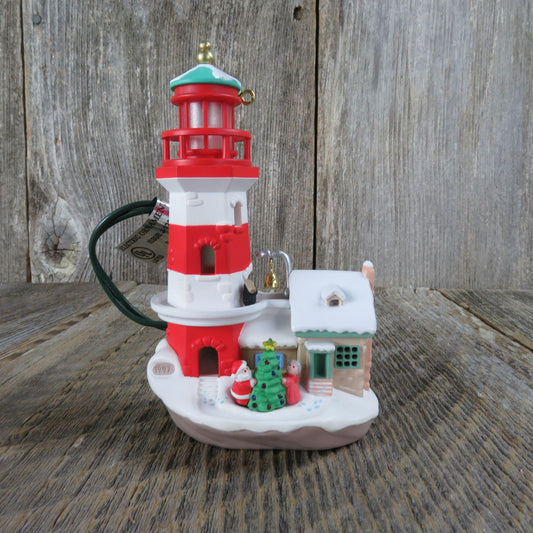 Vintage Lighthouse Greetings Ornament Red White Santa Claus Christmas Magic Light Hallmark 1997 Video