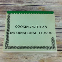 Load image into Gallery viewer, Vintage California Cookbook Cooking With An International Flavor 1985 Folk Dance - At Grandma&#39;s Table