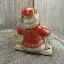 Load image into Gallery viewer, Swinging Santa Christmas Ornament Pottery Set Glazed Ceramic Red Blue Gloss - At Grandma&#39;s Table