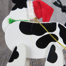 Load image into Gallery viewer, Vintage Cow On Skis Ornament Wooden Avon Christmas Holstein Black White Red Santa Hat Wood Country Rustic