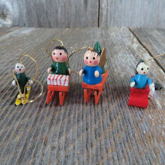 Vintage Wood Angel On Sleds and Skis Ornament Set Lot Christmas Wooden Miniature Green Red Blue