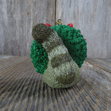 Load image into Gallery viewer, Vintage Raccoon in Wreath Ornament Christmas Resin Green Red