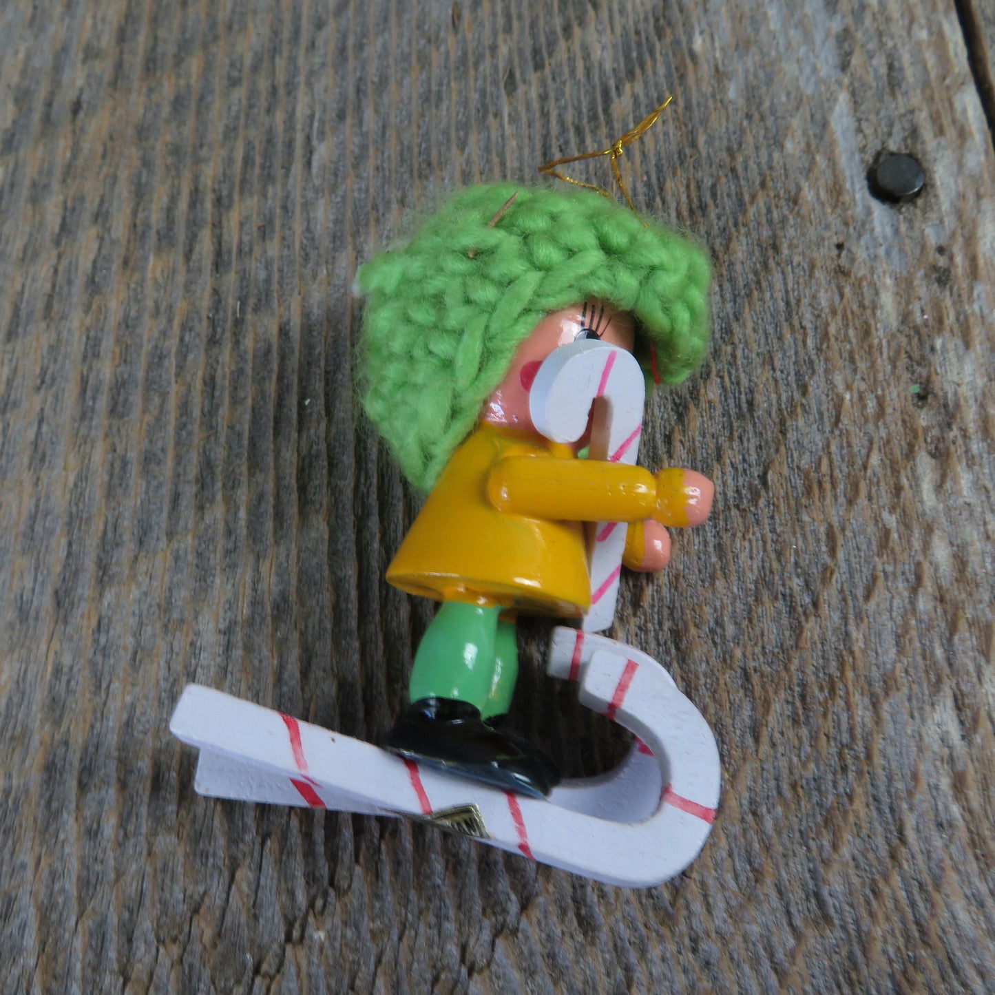 Vintage Girl Skiing with Candy Cane Ornament Green Knit Hat Yellow Shirt Candy Cane Skis