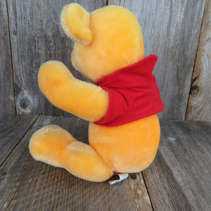 Vintage Winnie the Pooh Plush Musical Jointed Stuffed Animal Disney Store Yellow Red Shirt - At Grandma's Table