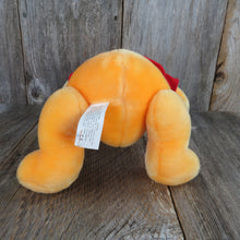 Load image into Gallery viewer, Vintage Winnie the Pooh Plush Musical Jointed Stuffed Animal Disney Store Yellow Red Shirt - At Grandma&#39;s Table