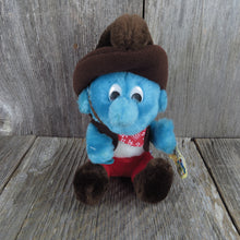 Load image into Gallery viewer, Vintage Cowboy Smurf Plush Wallace Berrie Character Stuffed Animal Blue Red Brown 1983 - At Grandma&#39;s Table