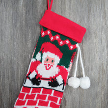Load image into Gallery viewer, Vintage Santa Claus in Chimney Stocking Knit Christmas Pom Poms Red Green White 1980s - At Grandma&#39;s Table