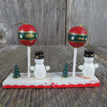 Load image into Gallery viewer, Vintage Snowman with Balloon and Tree Wood Ornament Set Christmas Wooden Scene Figurine Village - At Grandma&#39;s Table