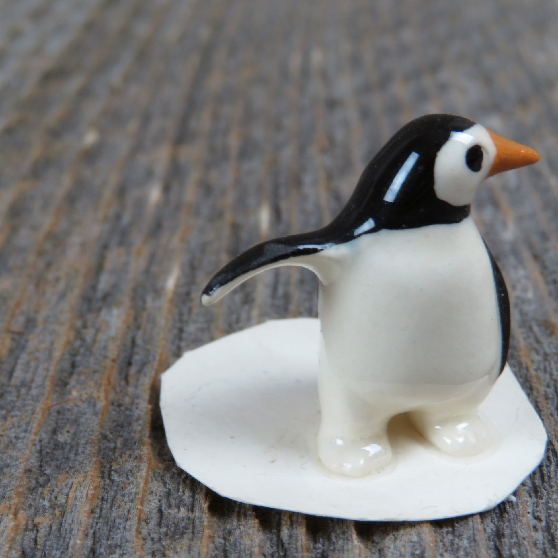 Penguin On Skis - miniature porcelain figurine