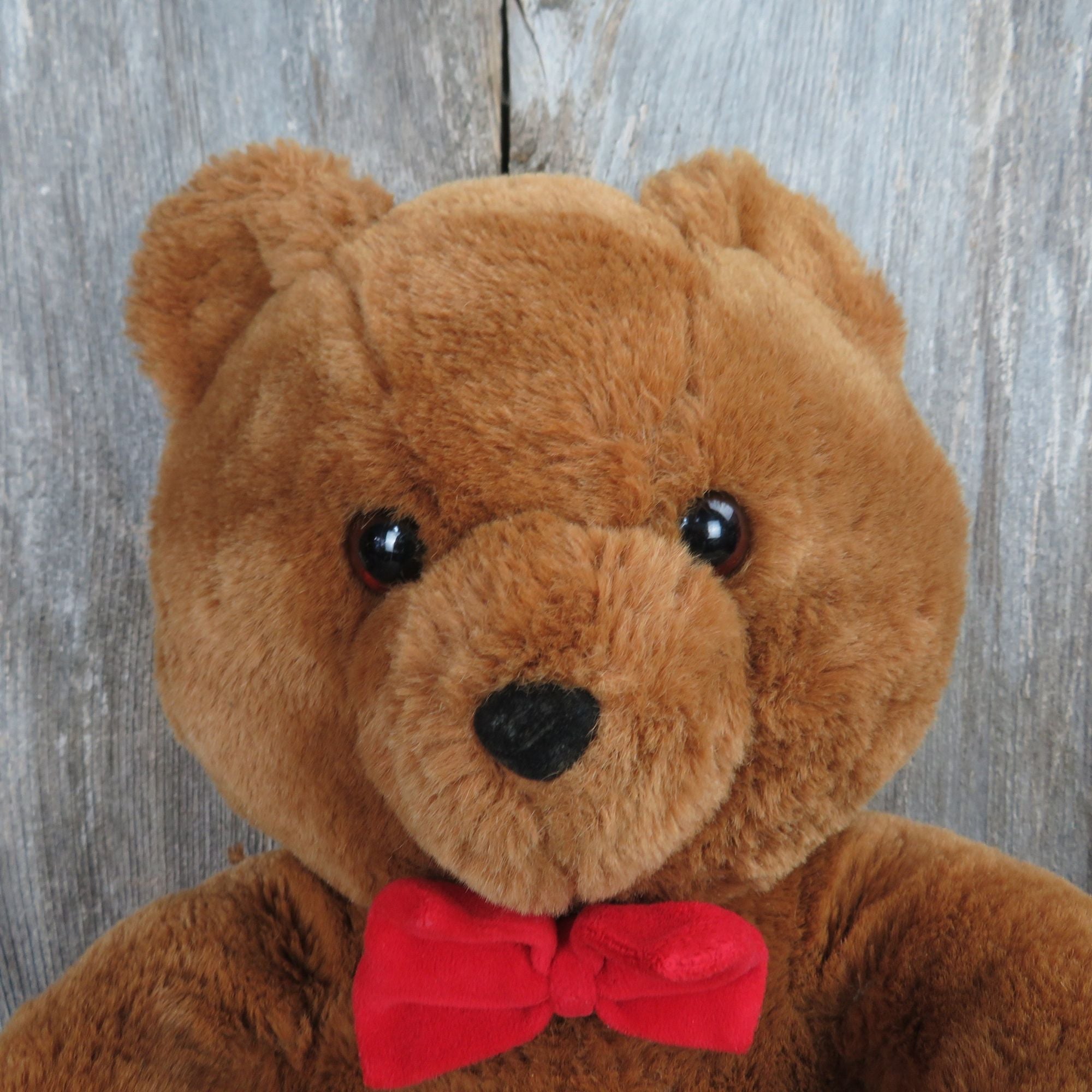 Teddy bear store red bow tie