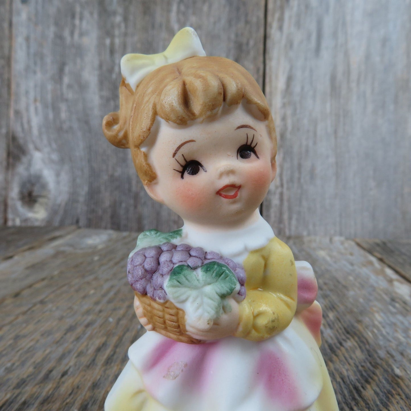 Vintage Girl with Grape Basket Figurine Enesco Red Blond Hair Yellow Dress Pink Apron