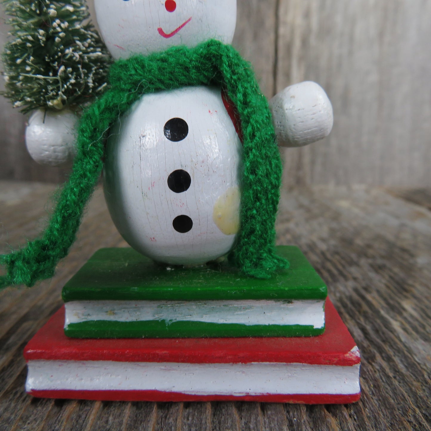 Vintage Snowman Holding Christmas Tree Wood Ornament Bottle Brush Tree Green Scarf Red Hat Vest Standing On Books Wood Taiwan