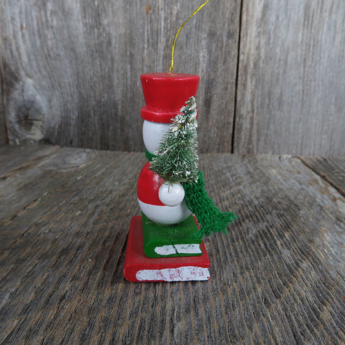 Vintage Snowman Holding Christmas Tree Wood Ornament Bottle Brush Tree Green Scarf Red Hat Vest Standing On Books Wood Taiwan