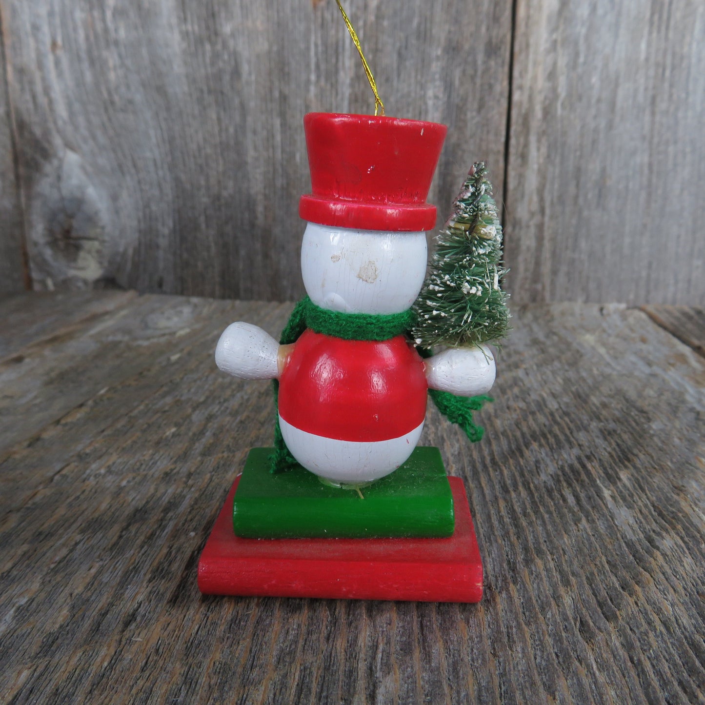 Vintage Snowman Holding Christmas Tree Wood Ornament Bottle Brush Tree Green Scarf Red Hat Vest Standing On Books Wood Taiwan