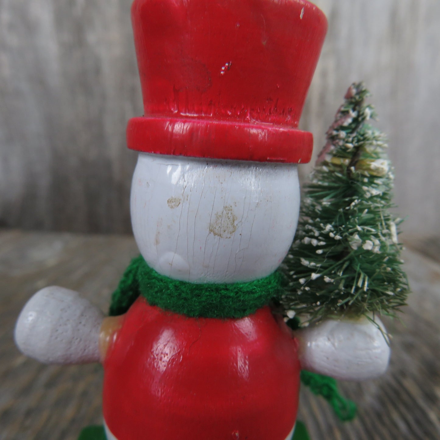 Vintage Snowman Holding Christmas Tree Wood Ornament Bottle Brush Tree Green Scarf Red Hat Vest Standing On Books Wood Taiwan