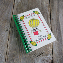 Load image into Gallery viewer, Vintage Children&#39;s Miracle Network Cookbook Seasoned with Sunshine Virginia McWhorter Valley River Center 1996