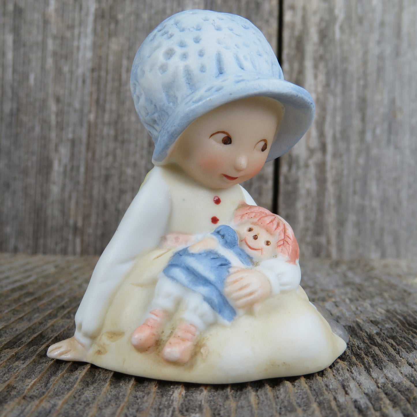 Vintage Holly Hobbie with Doll Figurine Sitting on the Floor Blue Bonnet Beige Apron Bisque Ceramic