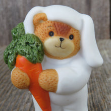 Load image into Gallery viewer, Bear in Bunny Suit Figurine Carrot Blue Bows Easter Lucy Rigg Enesco Vintage 1987
