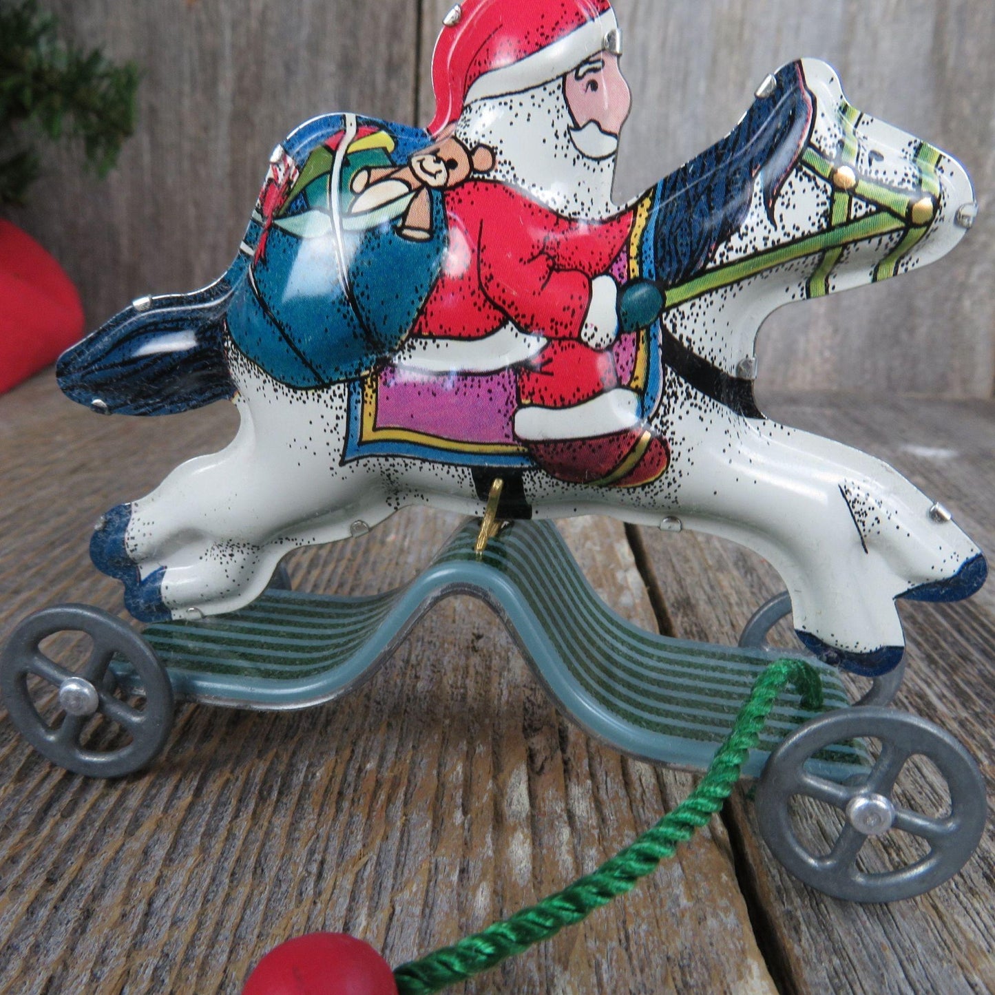 Vintage Tin Toy Ornament Galloping Into Christmas Santa Toy Pull Horse Hallmark 1991 with Display